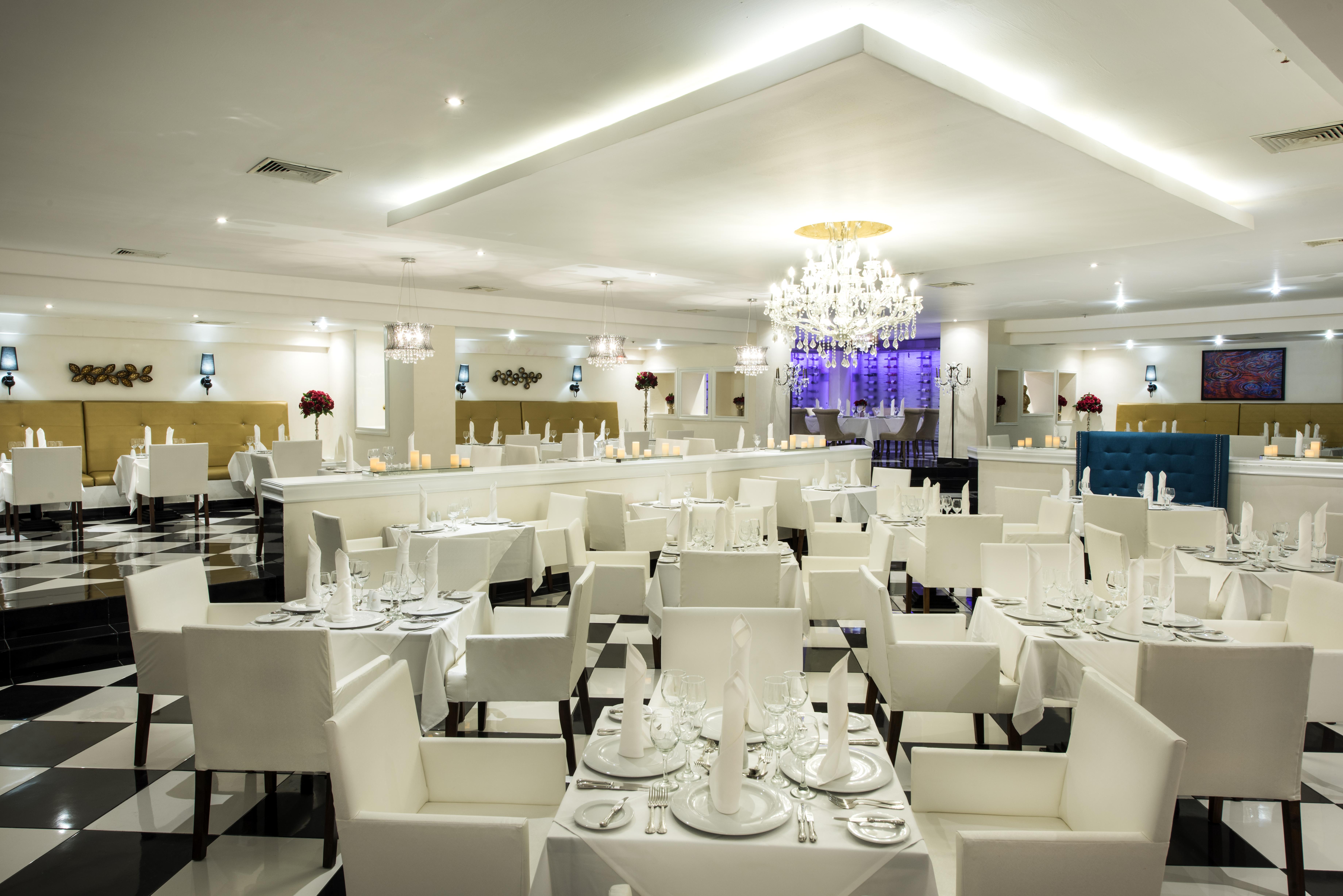 Occidental Punta Cana Exterior foto The interior of the restaurant